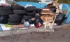 Старыми покрышками завалили контейнерную площадку в Воронеже